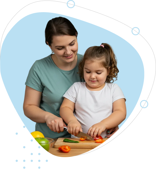 une maman et sa fille en train de cuisiner